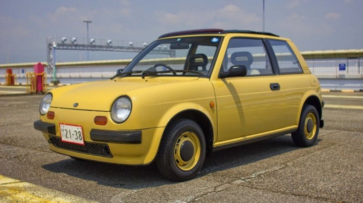 1989 Nissan Be-1, sárga hatchback, elölnézet balról