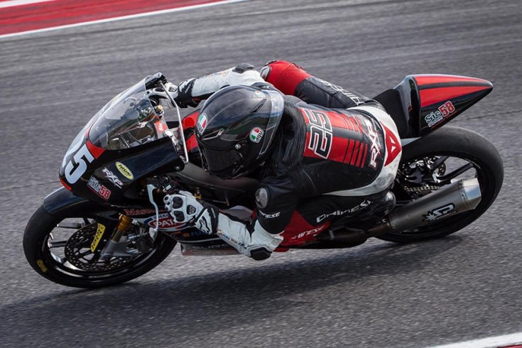 Kecskés Bence a motorján ülve