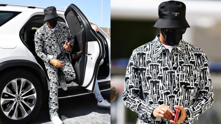 Lewis Hamilton egy Mercedesből kiszállás közben