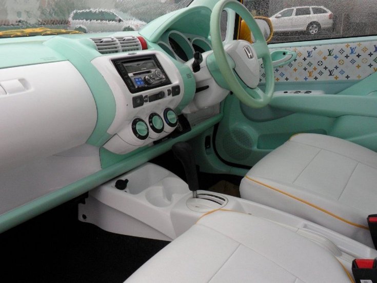 Honda Jazz fehér és menta zöld színű beltér